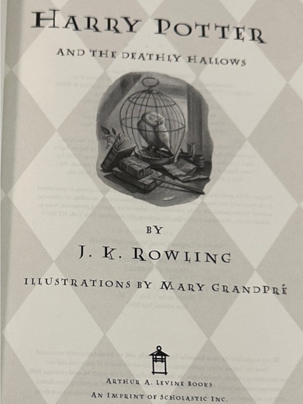 Scholastic Hardcover with Yellow Cloth Spine and Red Lettering